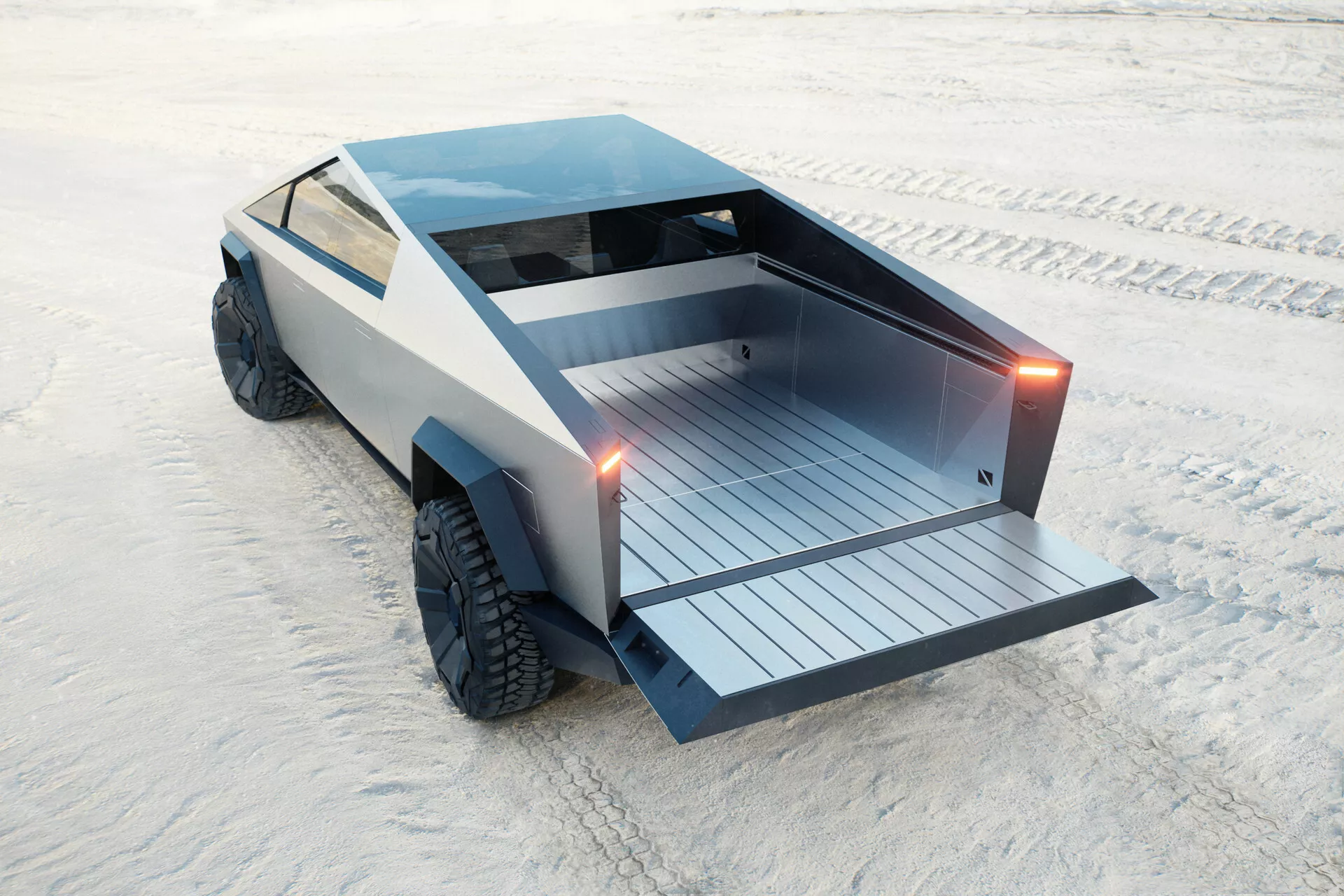 Obrázok ukazuje futuristický Tesla Cybertruck 2021 (1. generácia) z vysokého zadného trojštvrťového uhla, odhaľujúc jeho špecifický hranatý geometrický dizajn a robustnú konštrukciu. Truck má kovový povrch a veľké off-road pneumatiky s hrubým dezénom, čo naznačuje schopnosť v náročných jazdných podmienkach. Významné detaily zahŕňajú tenké vertikálne koncové svetlomety, plochú nakladaciu oblasť s horizontálnymi lamelami a čistý zadný dizajn bez viditeľnej rukoväte zadného veka. Prostredie sa zdá byť zasnežené v jasnom dennom svetle, čo zdôrazňuje možnú pokročilú odolnosť trucku a zložené materiály pre efektívnosť.